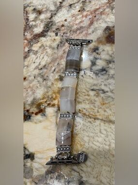 New in the box.  Cape Diablo Apple Watch strap.